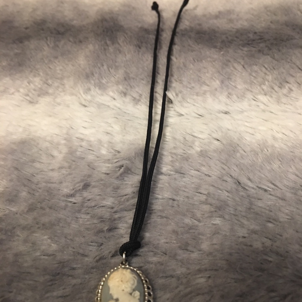 16” thick cord with costume portrait charm